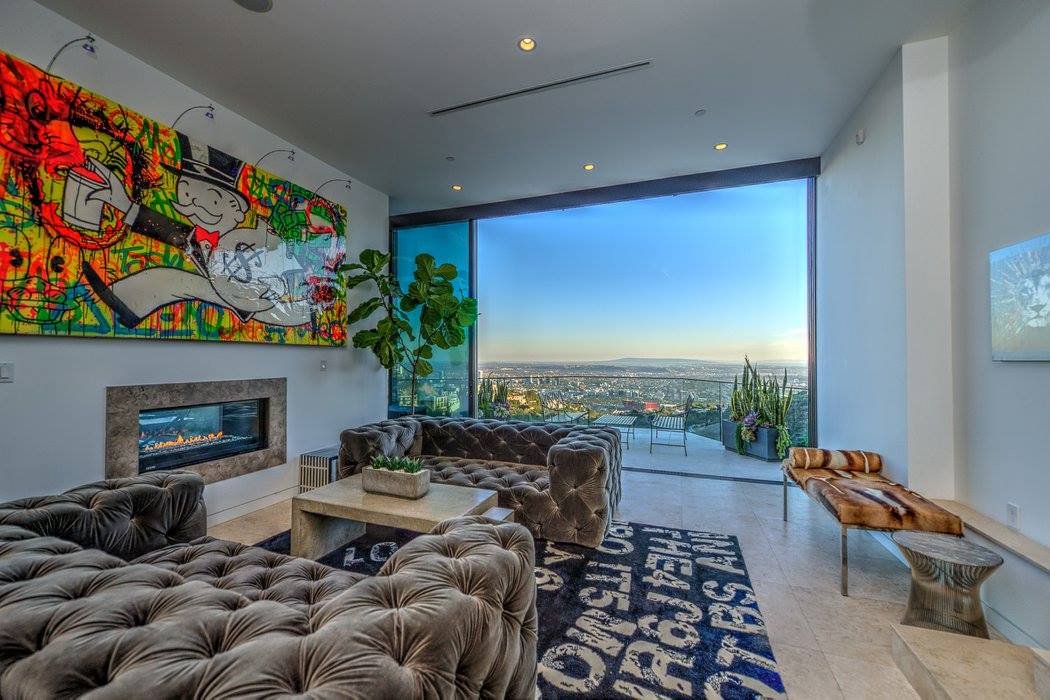 and-this-second-lavishly-appointed-living-room-which-also-has-alec-monopoly-art-in-it